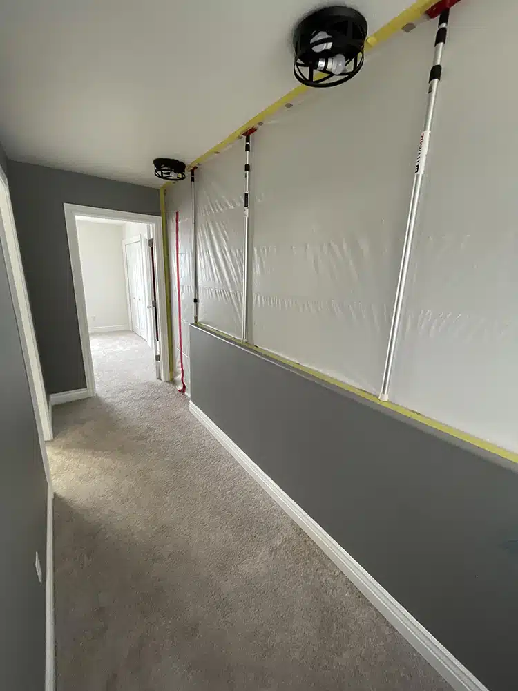 Water containment set up in hallway in Lehi, UT